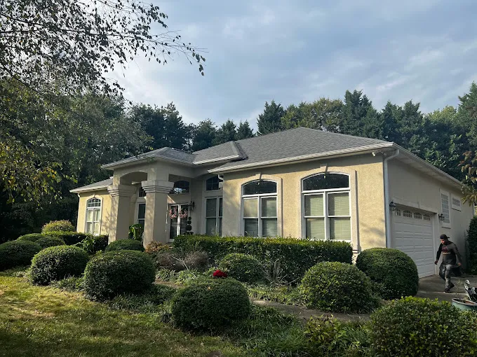 Triumph Roofing delivering expert roof replacement services in Huntersville, NC, with precision and quality materials