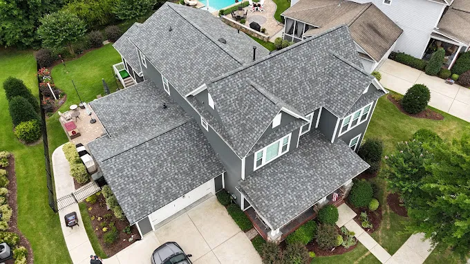 A beautifully renovated home featuring a premium roof installation by Triumph Roofing in Davidson, NC, highlighting expert craftsmanship and lasting durability