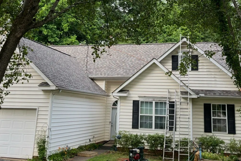 A stunning roof installation transformation by Triumph Roofing in Cornelius, NC, showcasing expert craftsmanship and premium materials