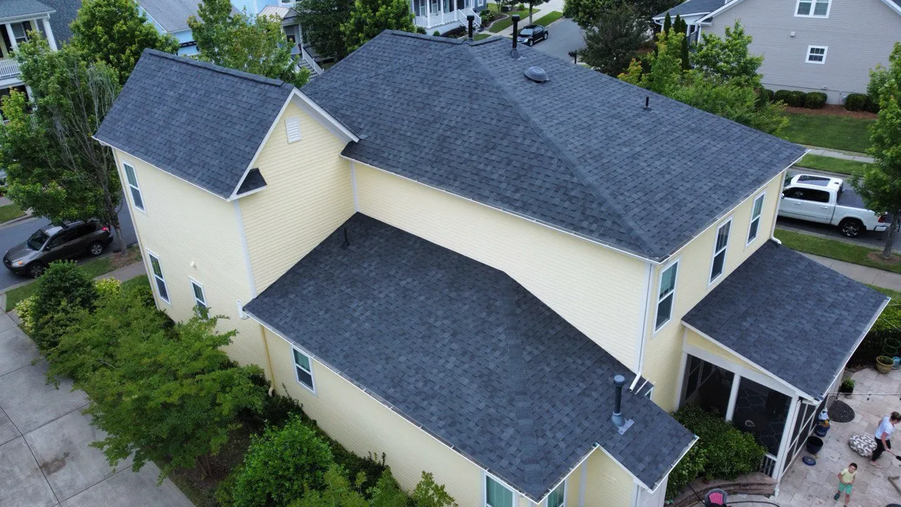 A durable and aesthetically pleasing grey shingle roof installed by Triumph Roofing in Monroe, NC