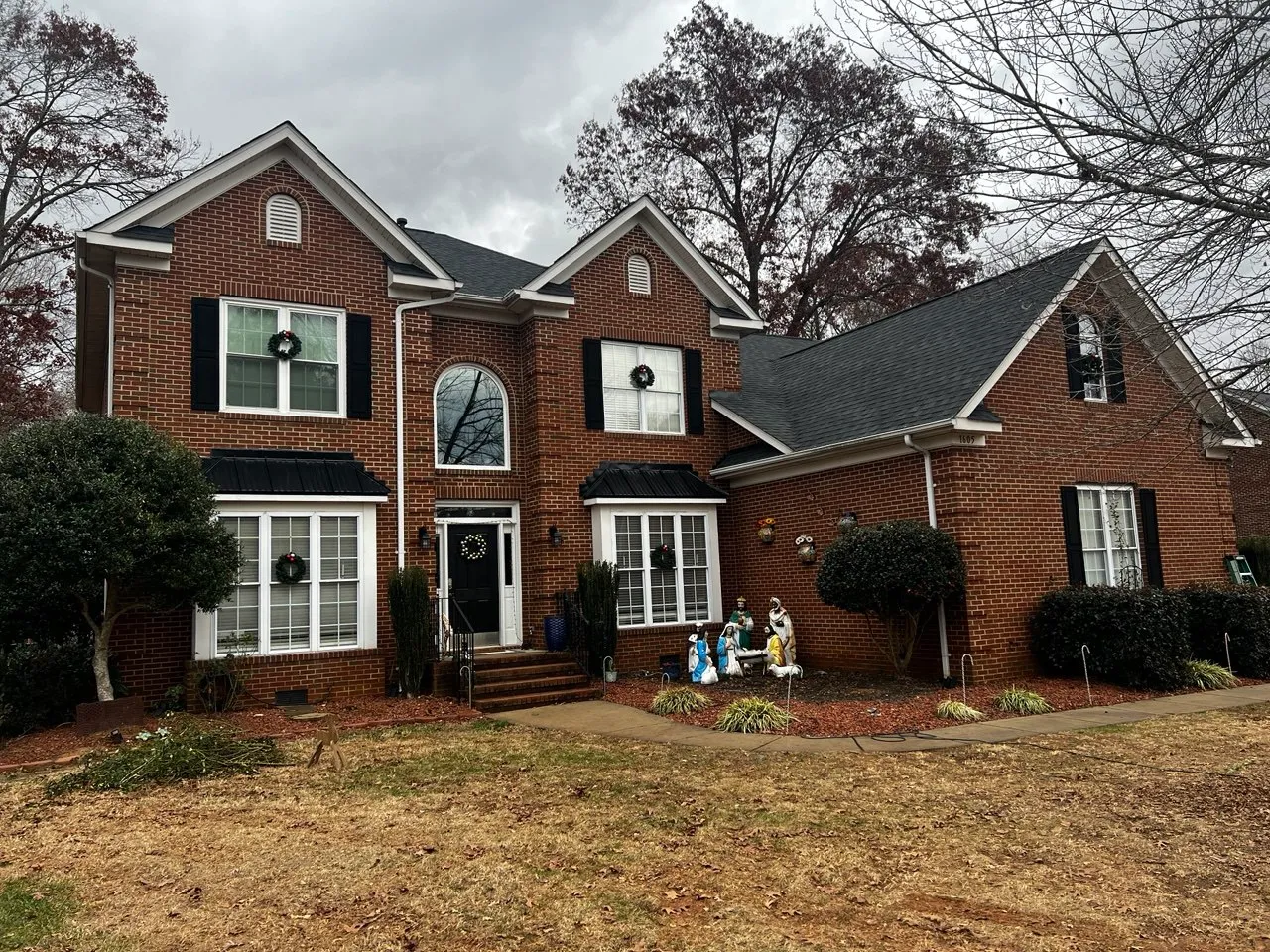 A stunning roof installation on a spacious home by Triumph Roofing, the leading Roofing Company in Mount Holly NC