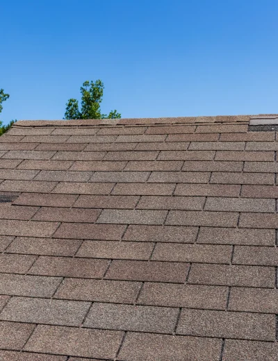 Three-tab shingles installed on a roof during roofing installation in Charlotte, NC