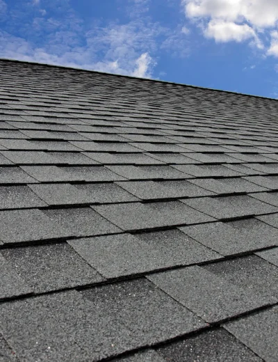 Close-up of asphalt shingles on a roof during roofing installation in Charlotte, NC